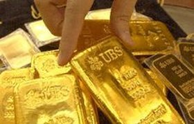 Золото взяло тысячедолларовый рубеж