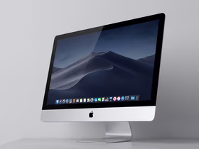 Серебристый iMac с macOS Mojave