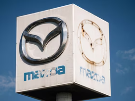 Потрёпанный логотип Mazda
