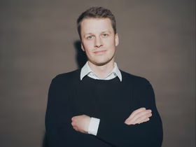 Николай Буц